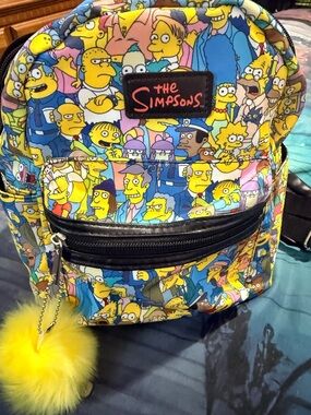 Source Unknown The Simpsons Mini Backpack in Yellow, Blue, Pink